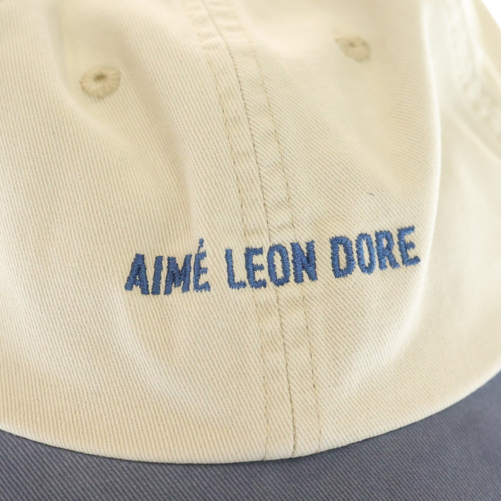 NO BRAND(ノーブランド) AIME LEON DORE Washed Cotton Cap エメ レオン ドレ ウォッシュ加工 フロントロゴ刺繍 6パネル コットン ベースボールキャップ 帽子 アイボリー/ブルー