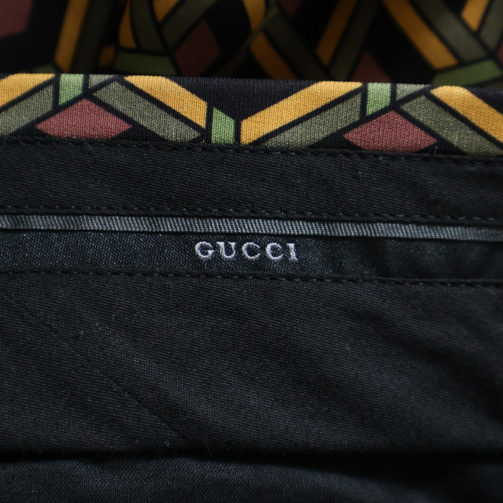 GUCCI(グッチ) 総柄プリント センターープレス スラックスパンツ ブラウン/イエロー