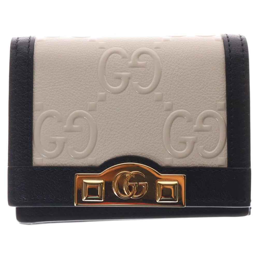 GUCCI(グッチ) GGエンボス レザー コンパクトウォレット 二つ折り財布 ホワイト×ブラック 676150