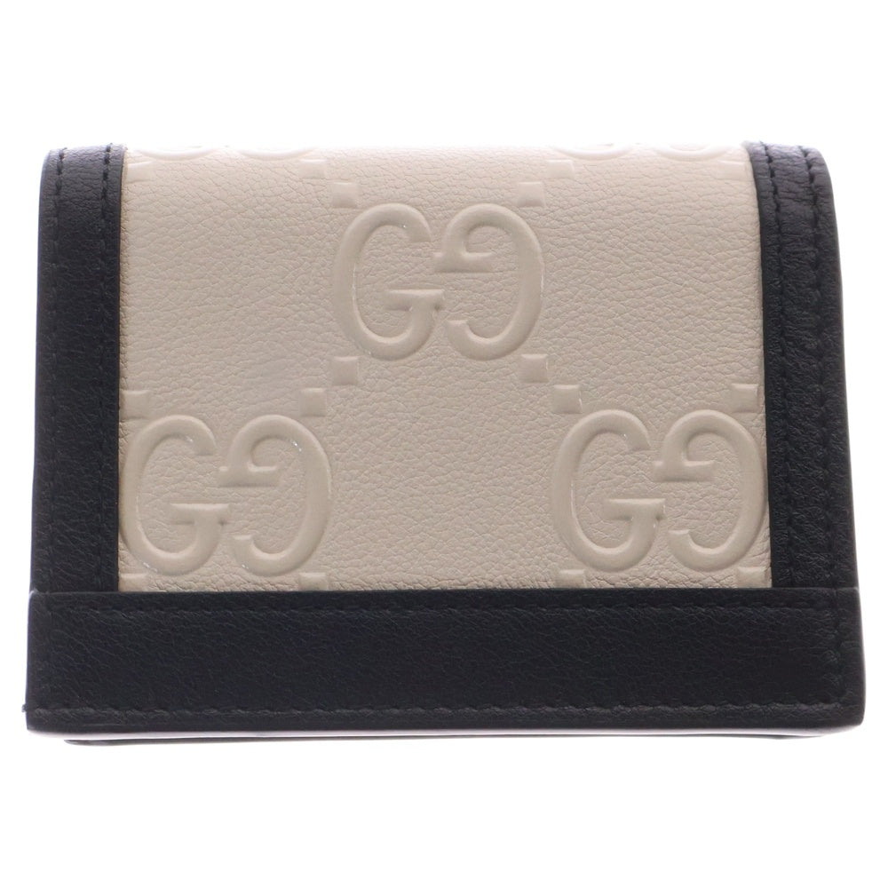 GUCCI(グッチ) GGエンボス レザー コンパクトウォレット 二つ折り財布 ホワイト×ブラック 676150