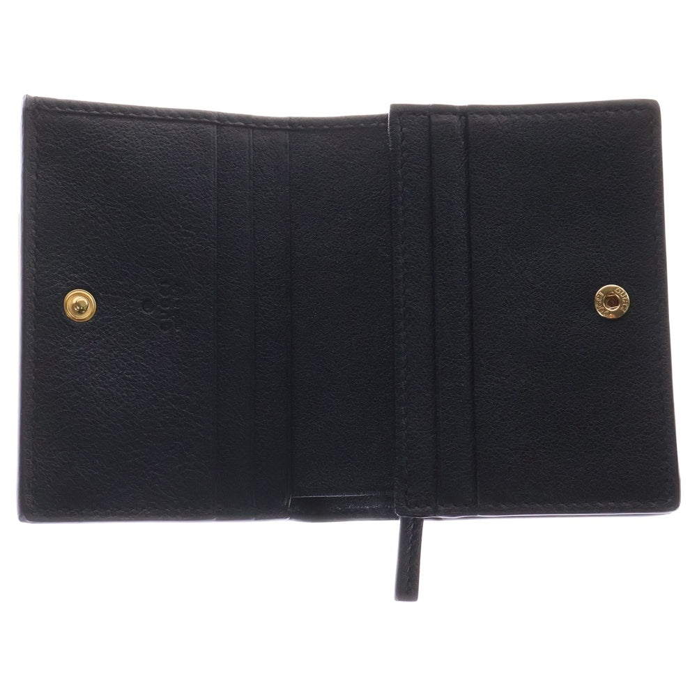 GUCCI(グッチ) GGエンボス レザー コンパクトウォレット 二つ折り財布 ホワイト×ブラック 676150
