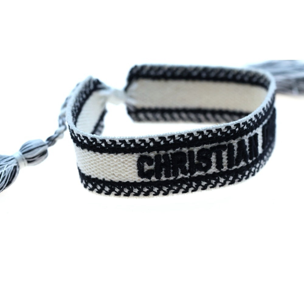 Christian Dior(クリスチャンディオール) ミサンガ ブレスレット ホワイト×ブラック コットン アクセサリー