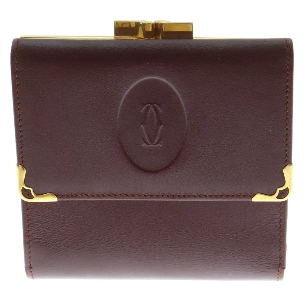 Cartier(カルティエ) エンボスロゴ カーフレザー がま口 コンパクトウォレット 二つ折り財布 ゴールド金具 ボルドー 〇