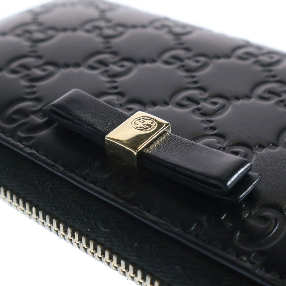 GUCCI(グッチ) グッチシマ インターロッキングG ロゴプレート リボン レザー ラウンドファスナー ロングウォレット 長財布 ゴールド金具 ブラック