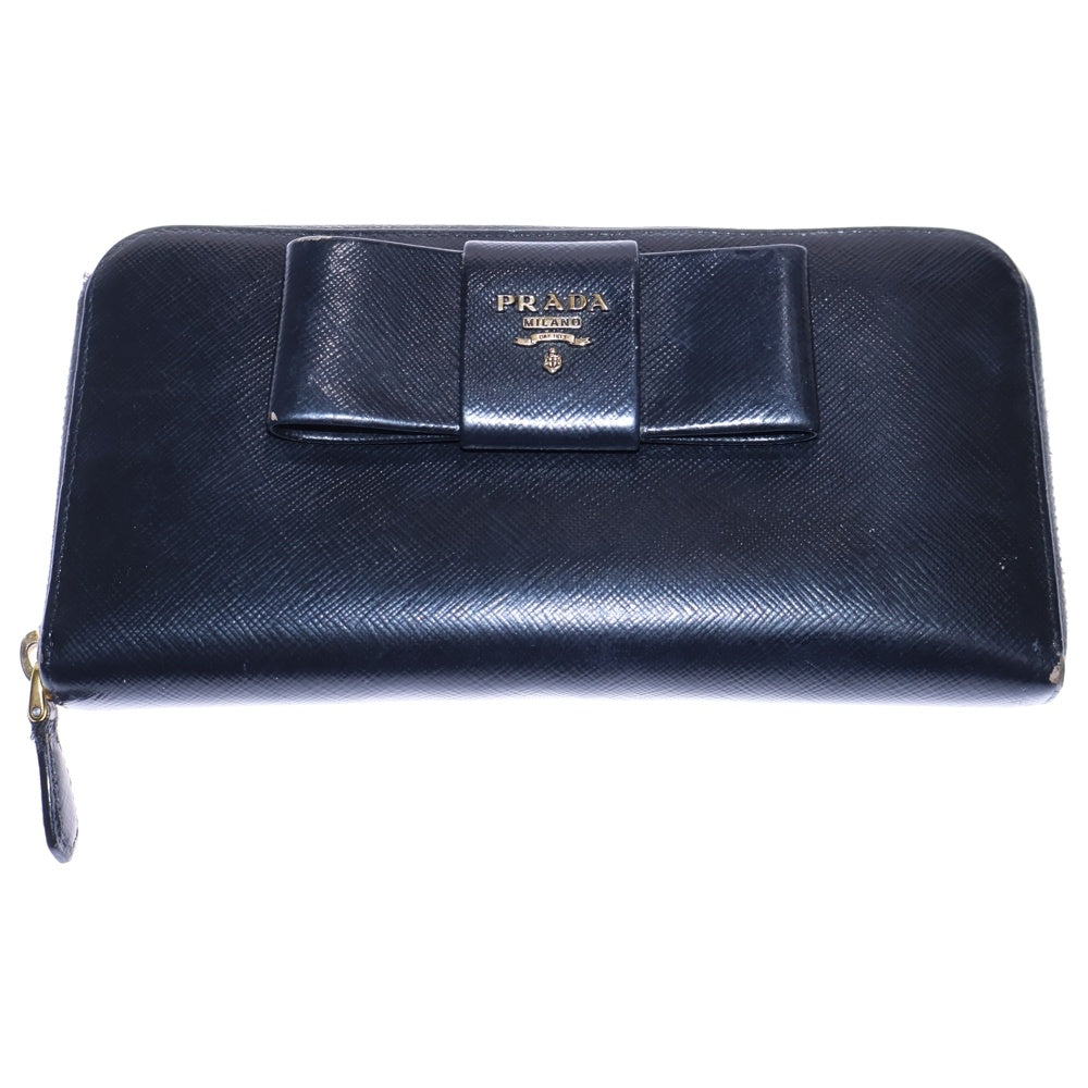 PRADA(プラダ) サフィアーノレザー ロゴプレート リボン ラウンドファスナー ロングウォレット 長財布 ゴールド金具 ブラック 1M0506