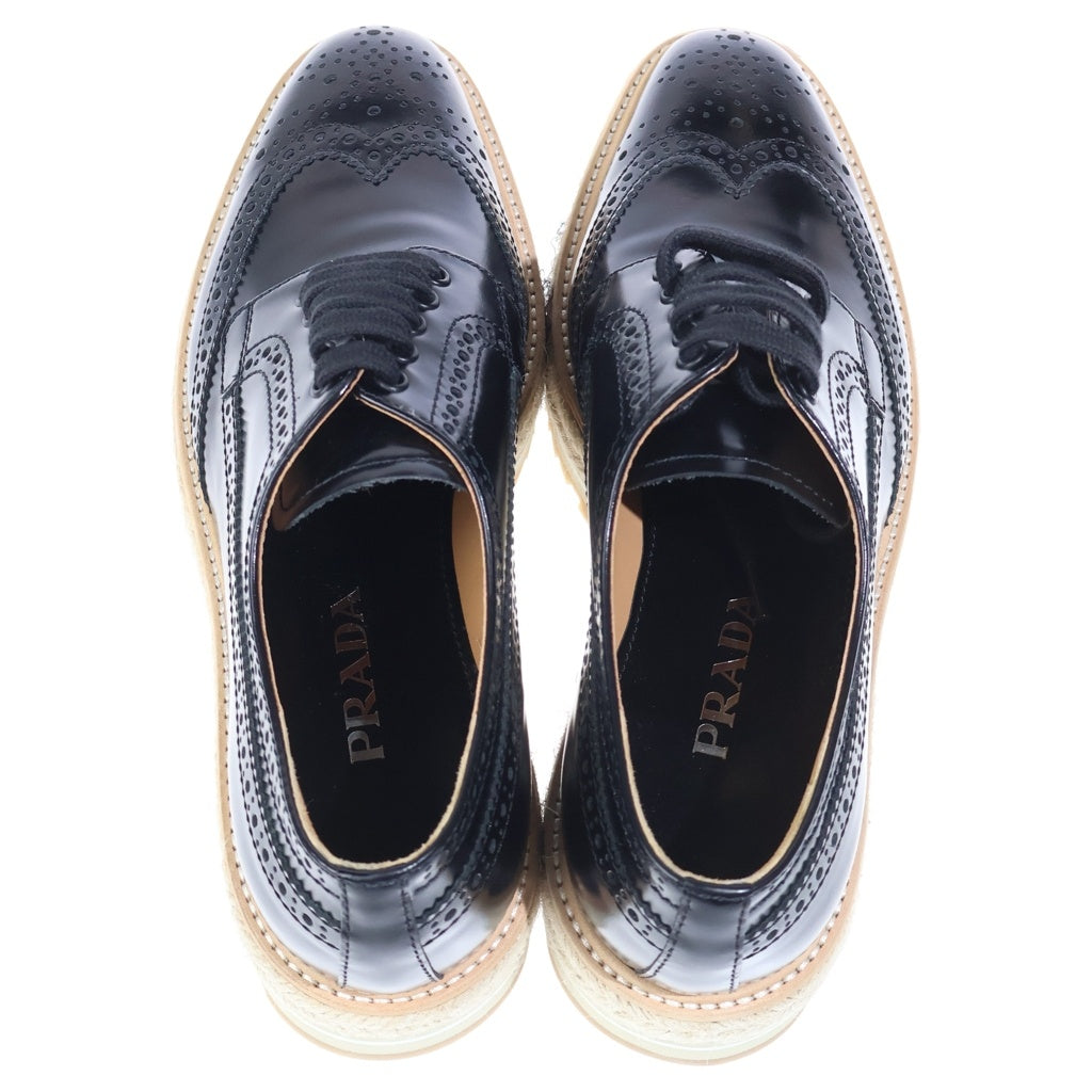 PRADA(プラダ) エスパドリーユ ウイングチップ メダリオン 厚底 レザー ローカット シューズ ブラック レディース