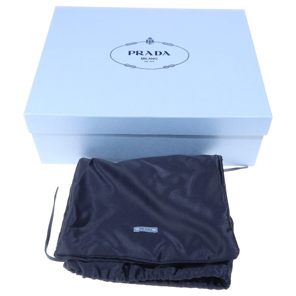 PRADA(プラダ) エスパドリーユ ウイングチップ メダリオン 厚底 レザー ローカット シューズ ブラック レディース