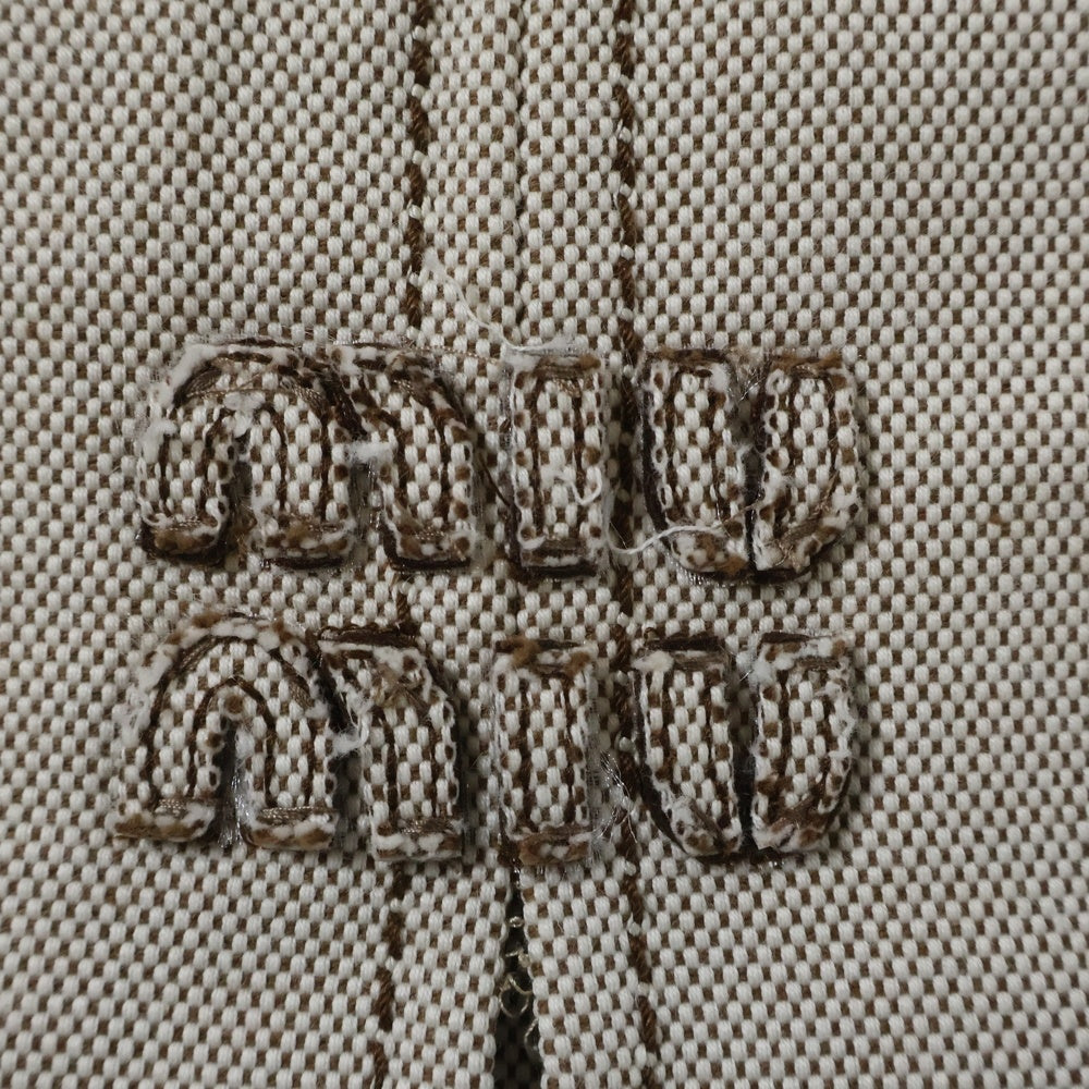 miumiu(ミュウミュウ) ワッペンロゴ レザートリム タックデザイン ミディアム スカート ベージュ/ブラウン レディース MG2198