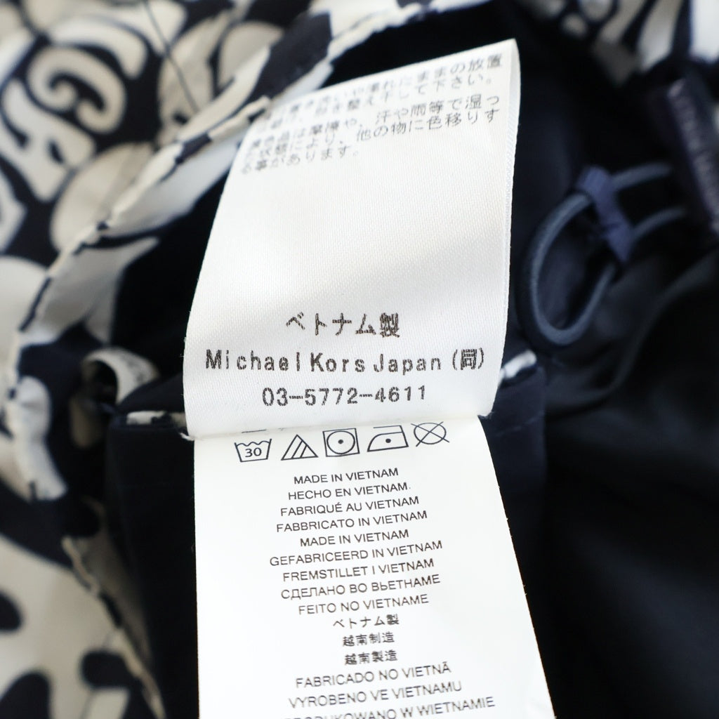MICHAEL KORS(マイケルコース) Graphic Logo Hooded Jacket グラフィックロゴ フーデッド ナイロンジャケット ホワイト/ブラック CU1200Y2GR