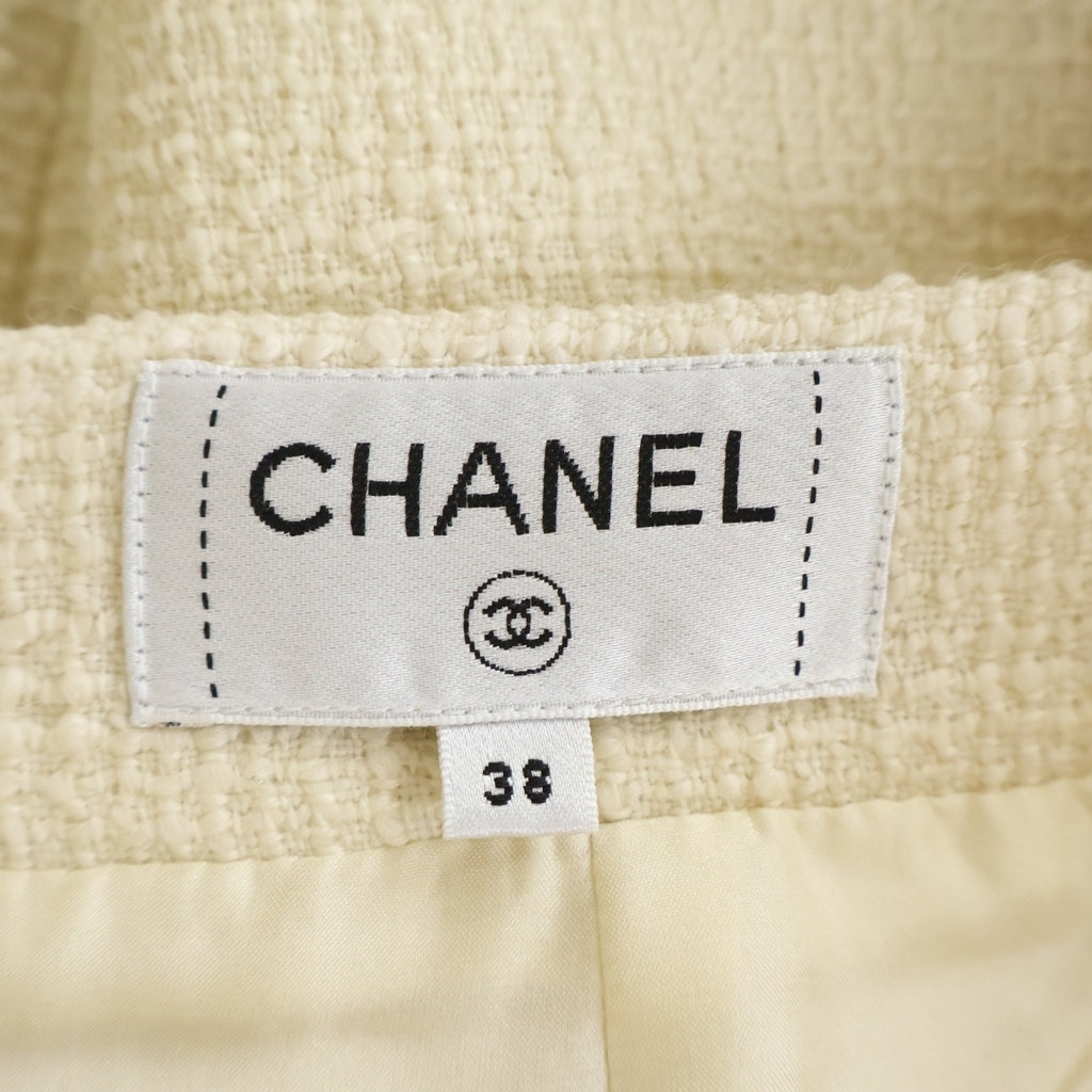 CHANEL(シャネル) セットアップ ツイード ココマークボタン ノーカラージャケット タイトミディアムスカート アイボリー レディース P56911V30555/P56912V30555