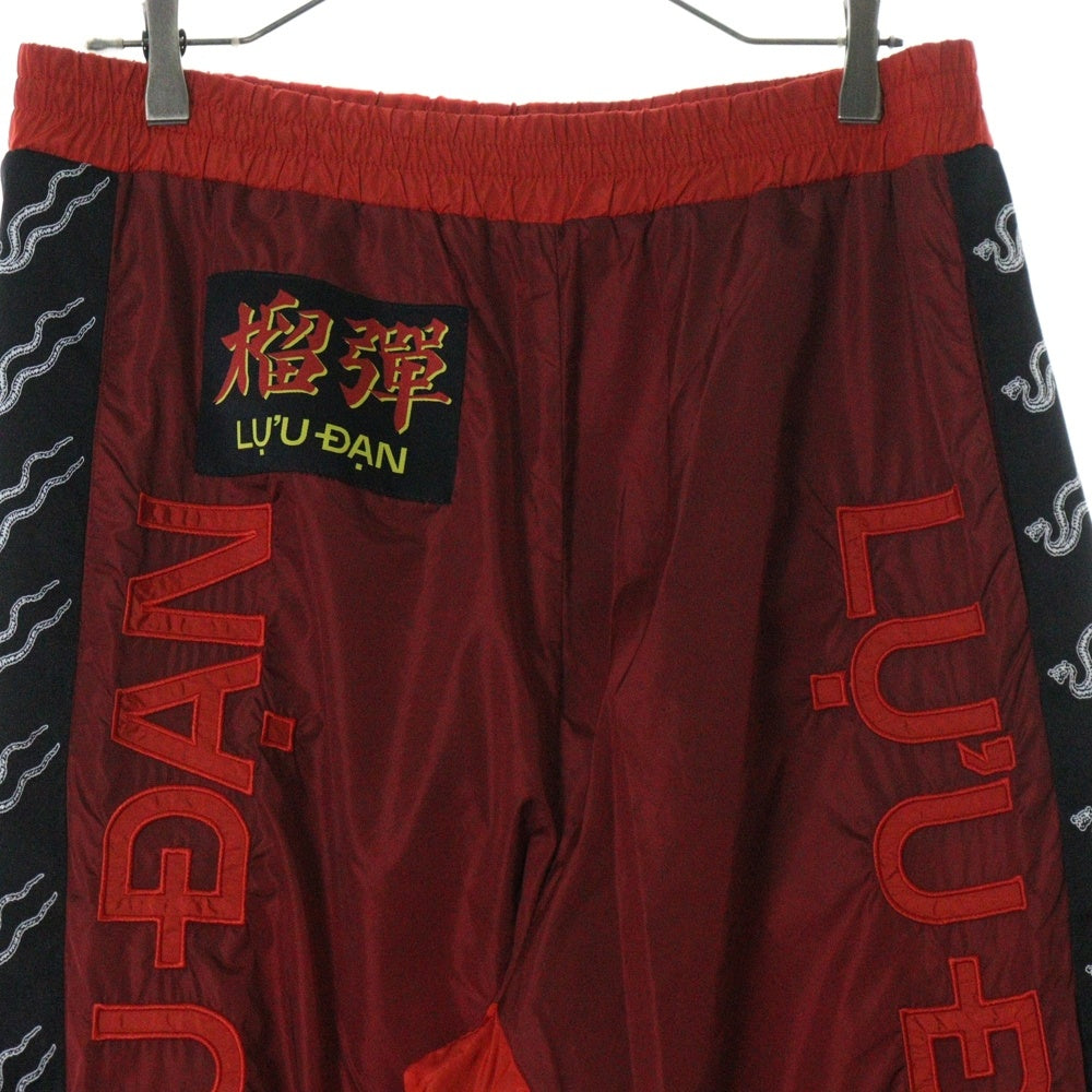 LU'U DAN(ルーダン) 25SS TRACKIES L-D ロゴサイドライントラックパンツ レッド MP031W_NS