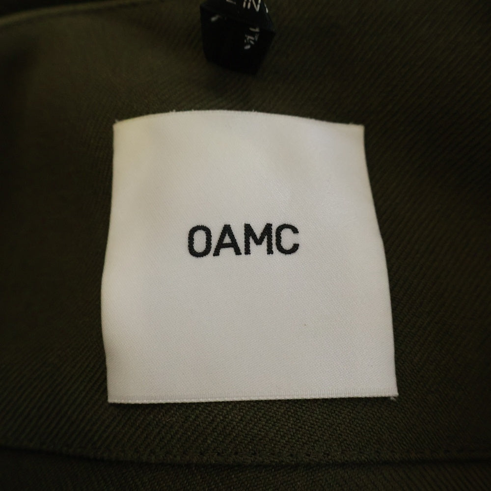 OAMC(オーエーエムシー) バージンウール ノーカラー長袖シャツ OAMR603225 オリーブ