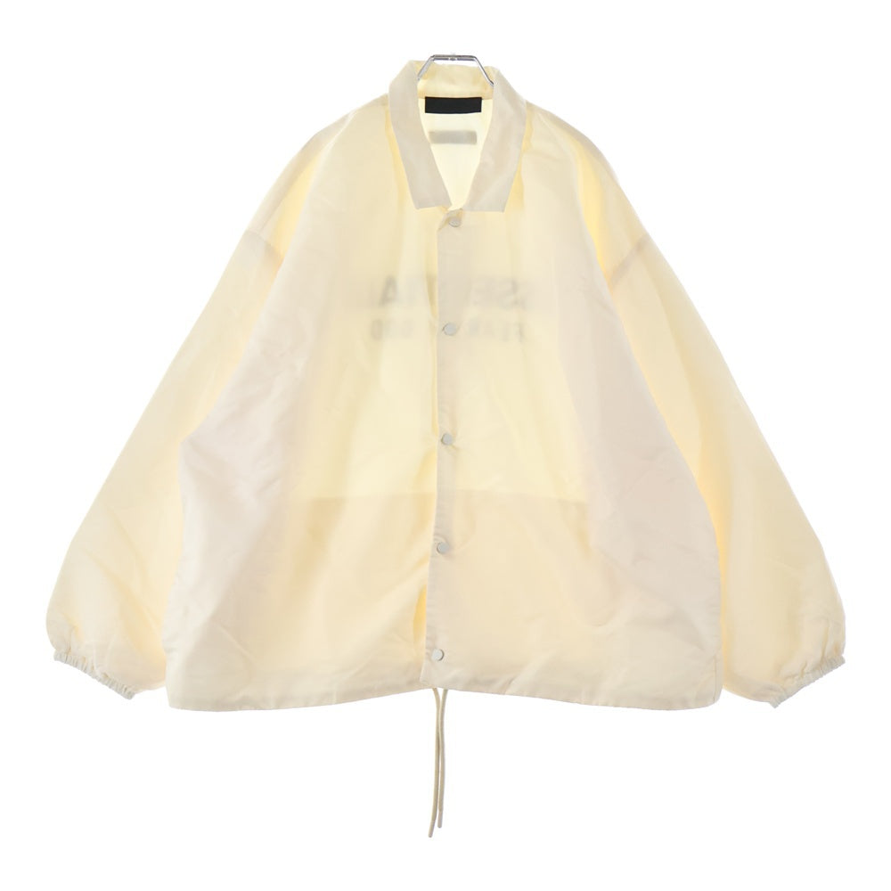 FEAR OF GOD ESSENTIALS(フィアオブゴッド エッセンシャルズ) NYLON COACH JACKET バックロゴ ナイロンコーチジャケット アイボリー