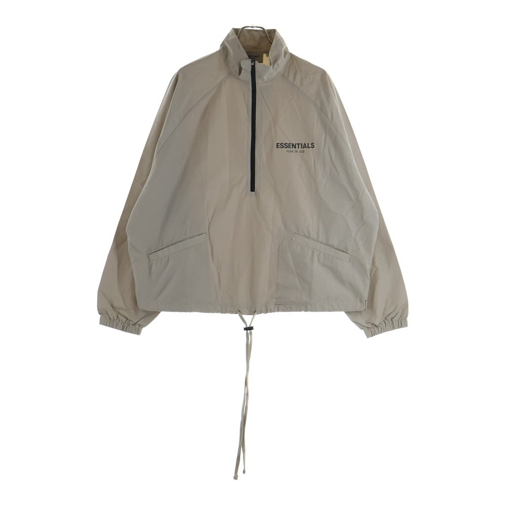 FEAR OF GOD ESSENTIALS(フィアオブゴッド エッセンシャルズ) HALF ZIP NYLON JACKET リフレクターロゴ ハーフジップ ナイロントラックジャケット ベージュ