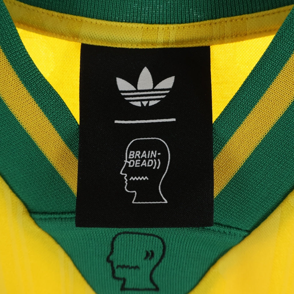 BRAIN-DEAD(ブレインデッド) ×adidas ×Disney Football Jersey アディダス ディズニー フットボールシャツ 半袖Tシャツ イエロー KR5195