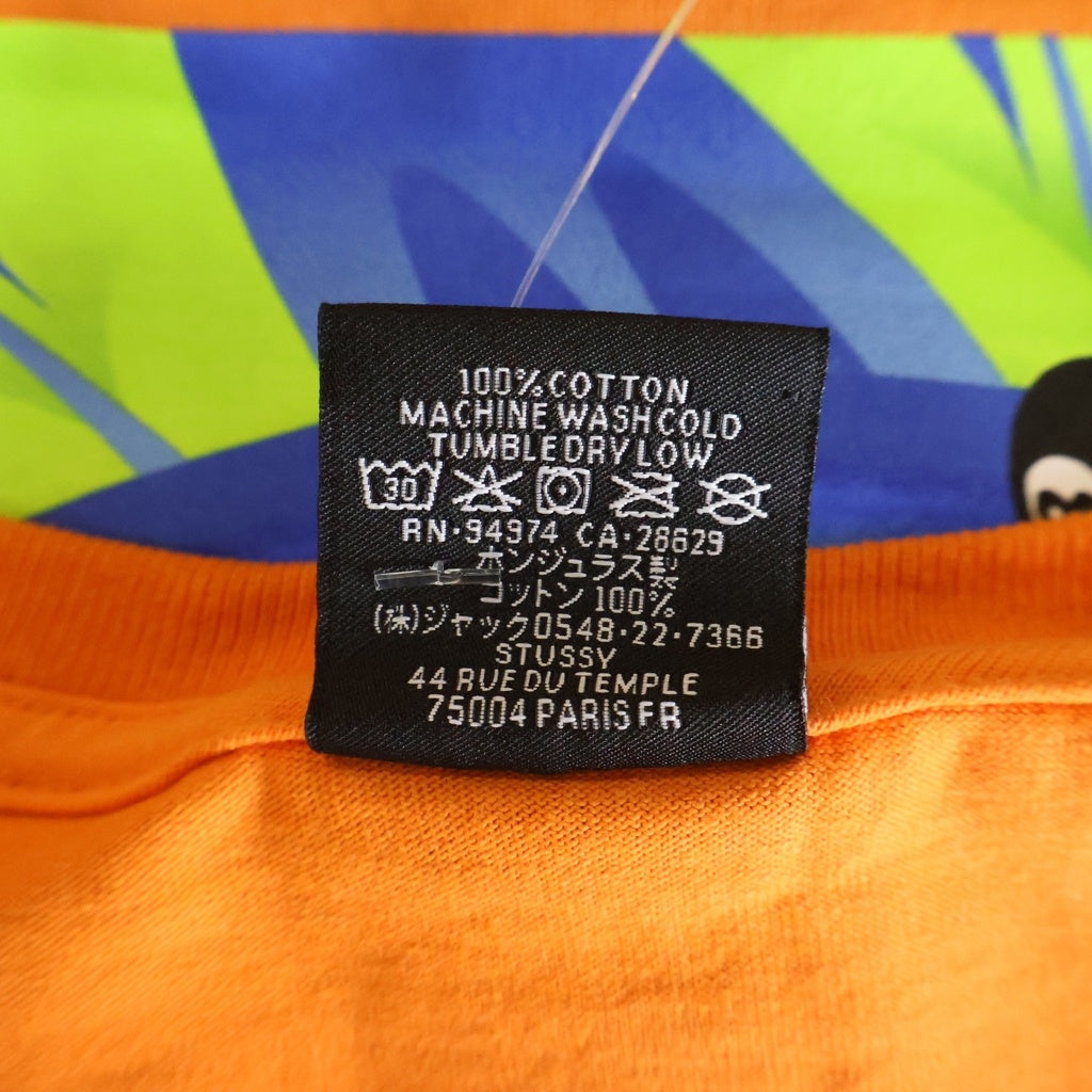 STUSSY(ステューシー) RABBIT HOLE TEE ラビットホール グラフィックプリント 半袖カットソー Tシャツ オレンジ