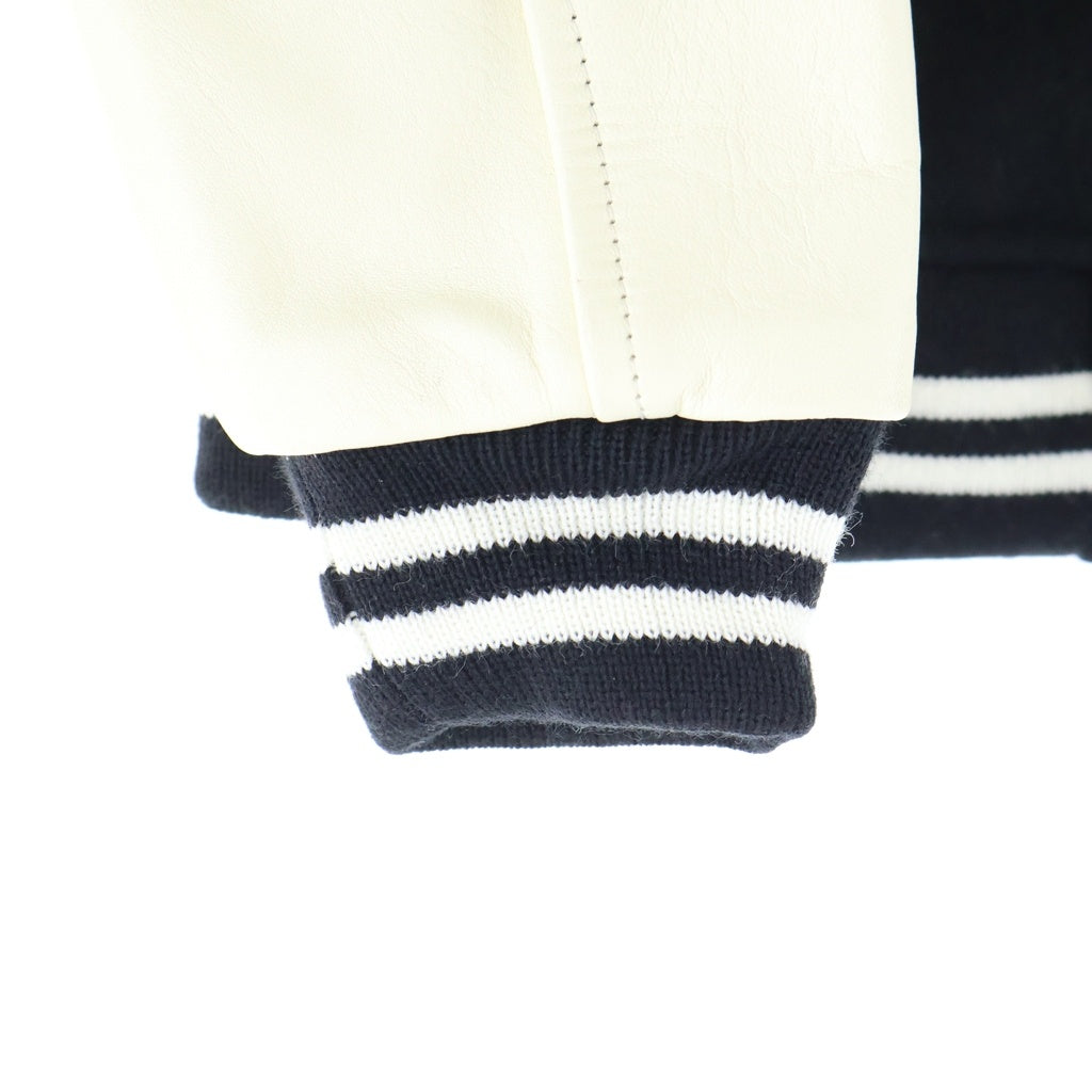 HUMAN MADE(ヒューマンメイド) 23AW ×KAWS VARSITY JACKET KIDS ×カウズ バーシティジャケット スタジャン ブラック XX26JK007