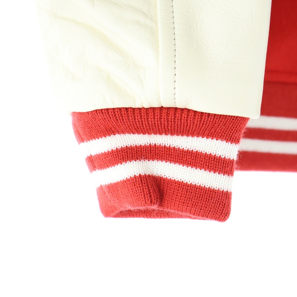 HUMAN MADE(ヒューマンメイド) 23AW ×KAWS VARSITY JACKET KIDS ×カウズ バーシティジャケット スタジャン レッド XX26JK007