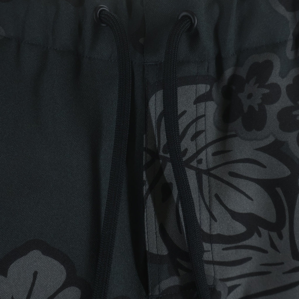 COMME des GARCONS HOMME PLUS(コムデギャルソンオムプリュス) 11SS ドローコード テーパード パンツ ハイビスカス柄 ダークグリーン EG-P024