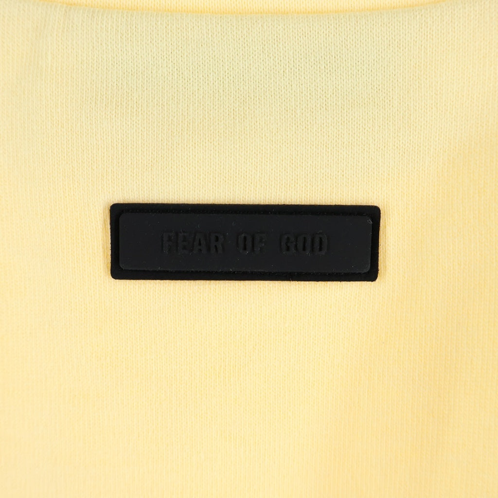 FEAR OF GOD ESSENTIALS(フィアオブゴッド エッセンシャルズ) HEAVY L/S T-SHIRT ラバーロゴ ヘビーオンス長袖Tシャツ ロンT イエロー