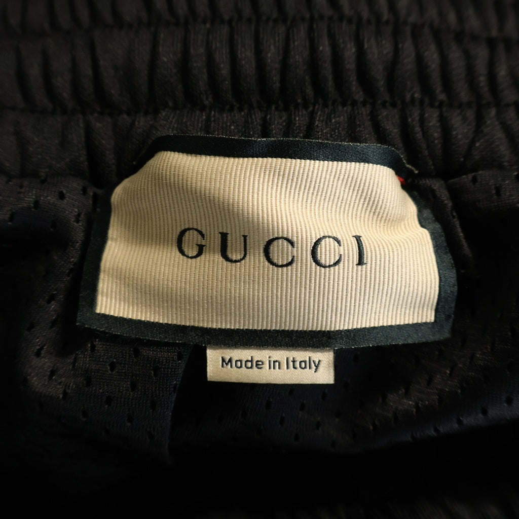 GUCCI(グッチ) Track Pants テクニカルジャージー 総柄トラックパンツ ブラック 768619 XJF4A
