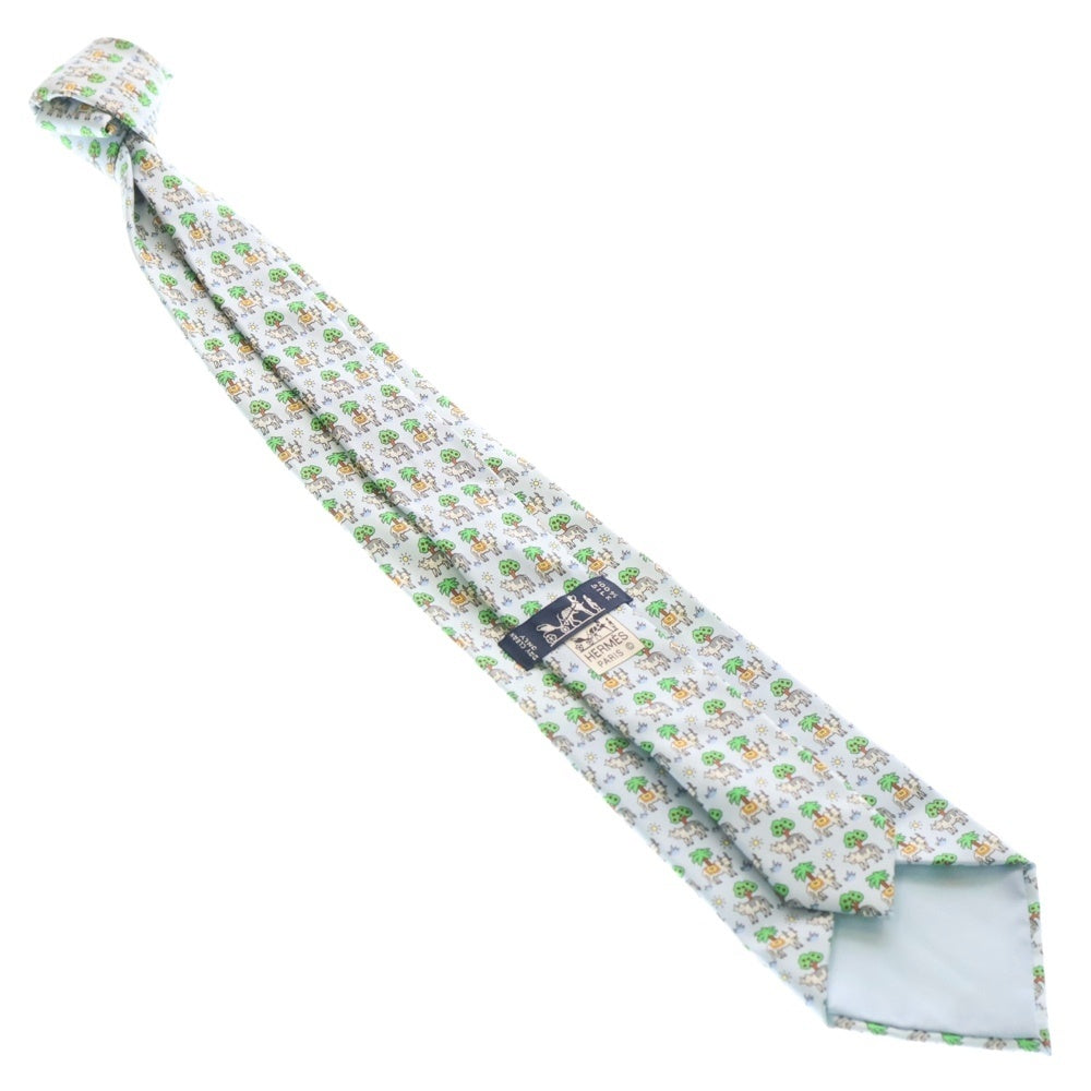 HERMES(エルメス) 総柄ロゴ 牛 シルク ネクタイ アクセサリー ライトブルー