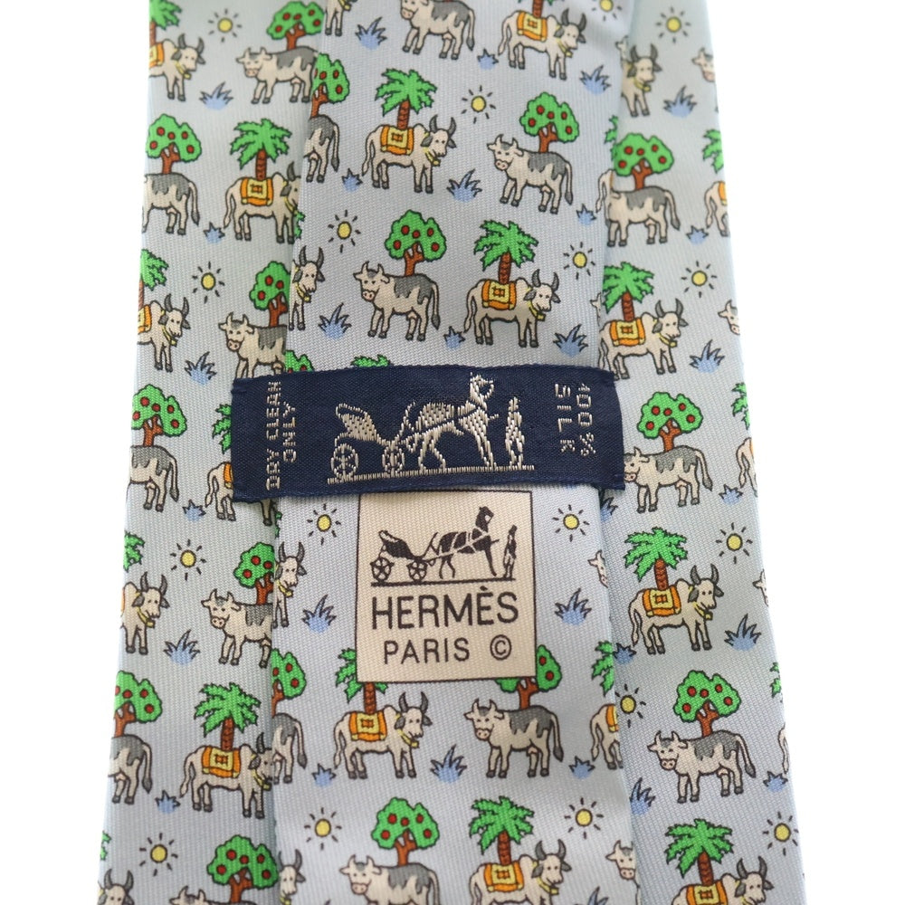 HERMES(エルメス) 総柄ロゴ 牛 シルク ネクタイ アクセサリー ライトブルー
