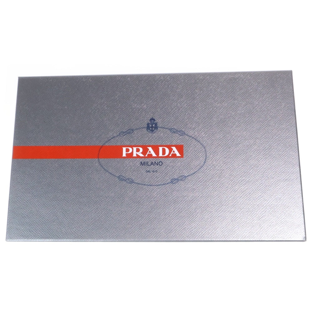 PRADA(プラダ) コミックロゴヒールパッチ レザーローカットスニーカー ブラック/ホワイト 4E3403