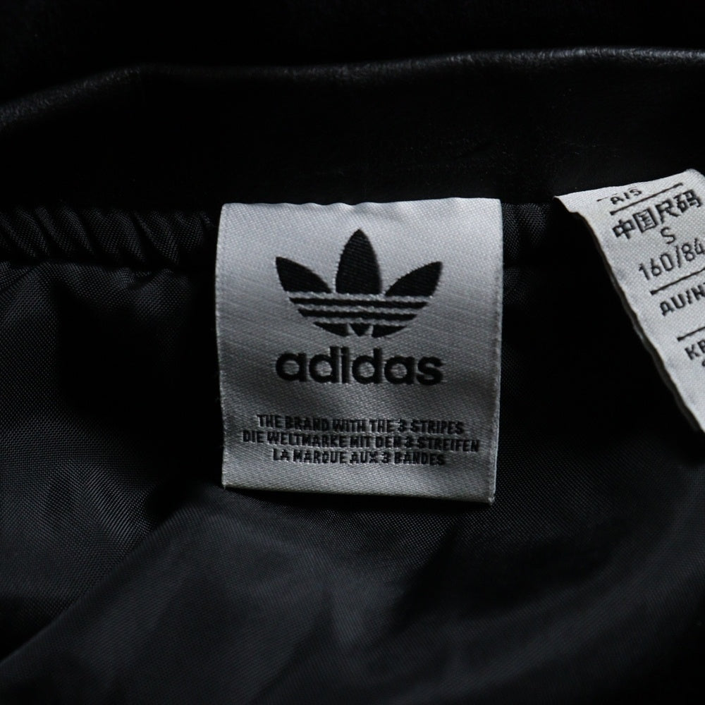 adidas Originals(アディダスオリジナルス) Adilenium Season3 FAUX LEATHER JUCKET JX9225 ヴィンテージ加工 フェイクレザー フーデッドブルゾンジャケット ブラック