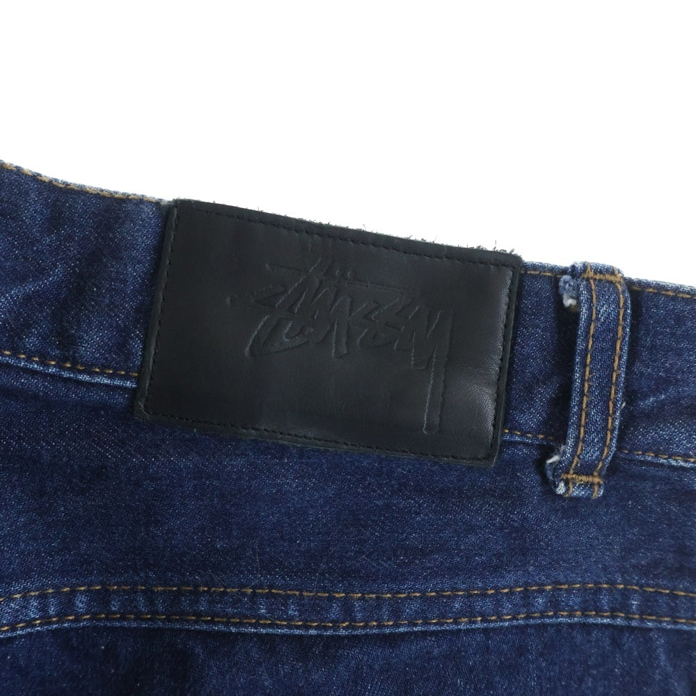 STUSSY(ステューシー) COW LEATHER PATCH DENIM PANTS カウレザーパッチ ワイドストレート デニムパンツ ジーンズ インディゴ