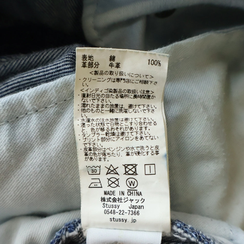 STUSSY(ステューシー) COW LEATHER PATCH DENIM PANTS カウレザーパッチ ワイドストレート デニムパンツ ジーンズ インディゴ