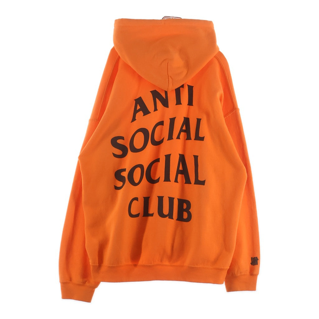 ANTI SOCIAL SOCIAL CLUB(アンチソーシャルソーシャルクラブ) ×Undefeated Still Paranoid Hoodie アンディフィーティド 両面プリント プルオーバーパーカー フーディ オレンジ