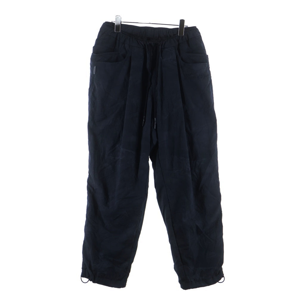 S.F.C(ストライプス フォー クリエイティ) WINDOBREAKER PANTS REAL TREE CAMO ロゴ刺繍 ナイロンイージーパンツ ブラック