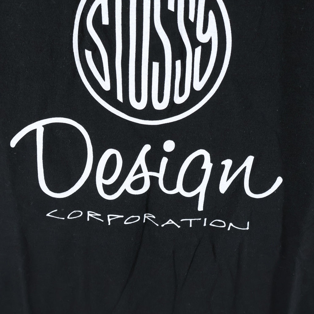 STUSSY(ステューシー) 00S OLD DESIGN COPORATION TEE オールド デザイン コーポレーション プリント クルーネック半袖Tシャツカットソー ブラック