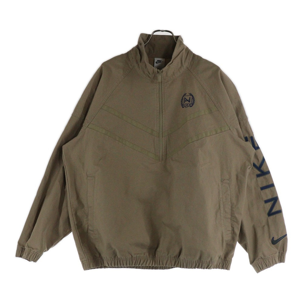 NIKE(ナイキ) AS M NK WR CANVAS JKT NCPS バックロゴ フロント刺繍 ハーフジップ ウィンドランナージャケット ベージュ FZ4727-247