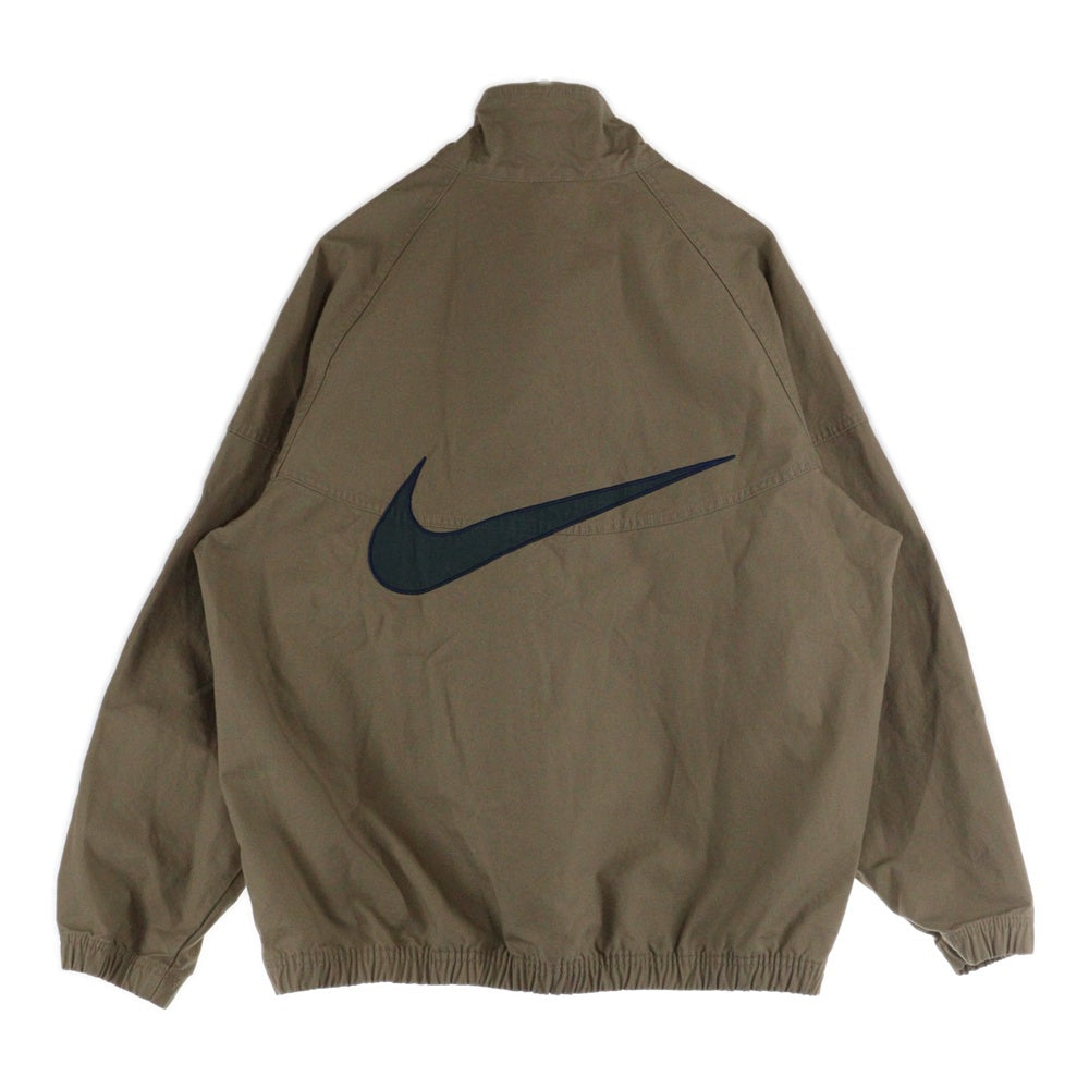 NIKE(ナイキ) AS M NK WR CANVAS JKT NCPS バックロゴ フロント刺繍 ハーフジップ ウィンドランナージャケット ベージュ FZ4727-247