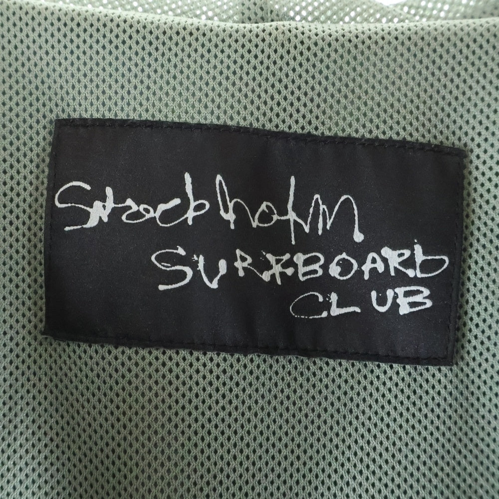Stockholm Surfboard Club(ストックホルムサーフボードクラブ) Stockholm Surfboard Club 総柄 フーデッド ナイロンジャケット グリーン 3920400143
