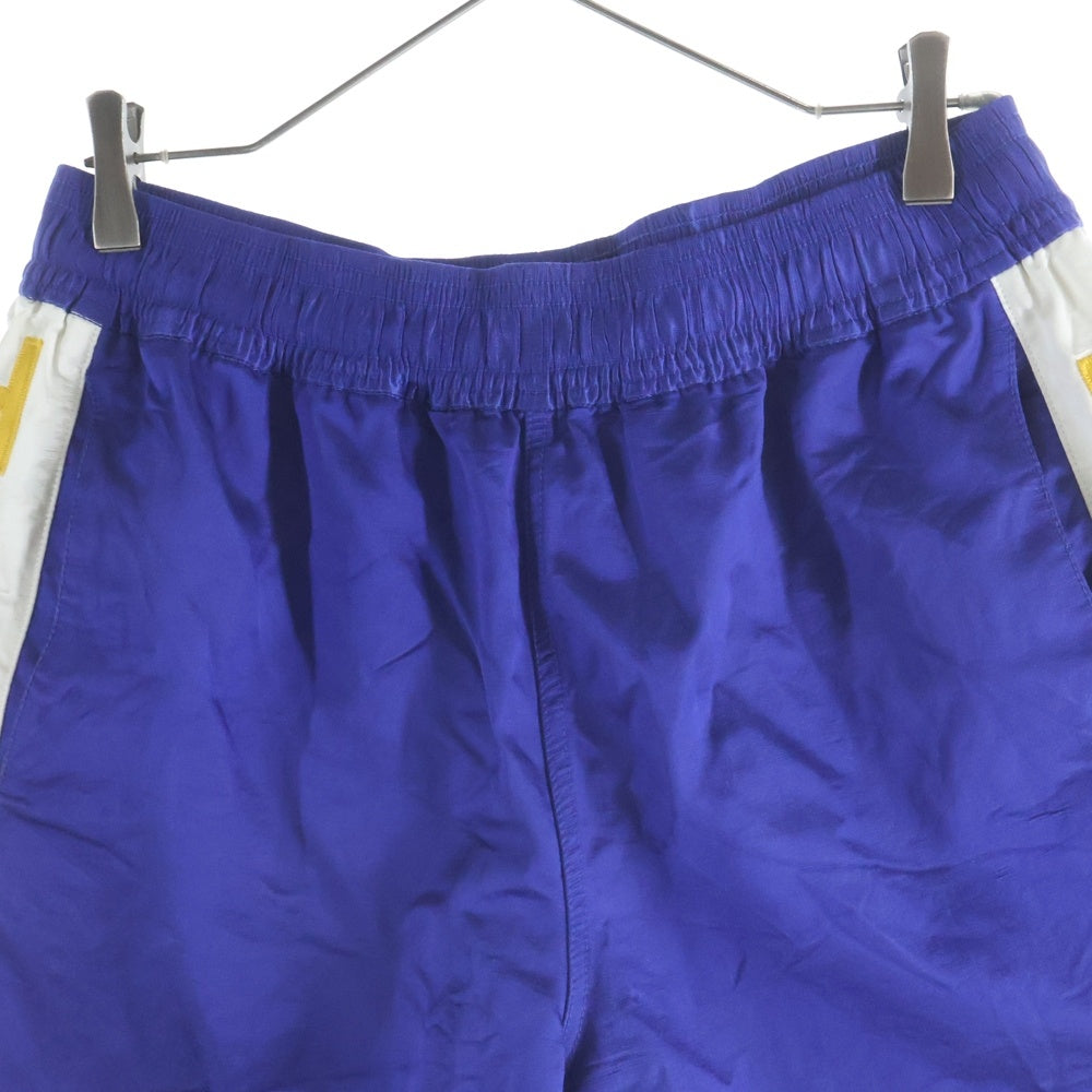 HUMAN MADE(ヒューマンメイド) 25SS GYM SHORTS サイドロゴ ナイロン ハーフパンツ ショーツ ブルー