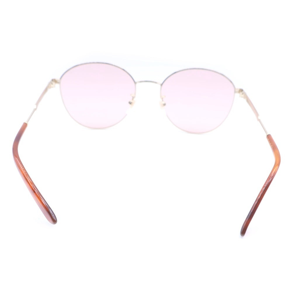 GUCCI(グッチ) インターロッキング GG メタルフレーム サングラス ゴールド/ブラウン GG0853SK