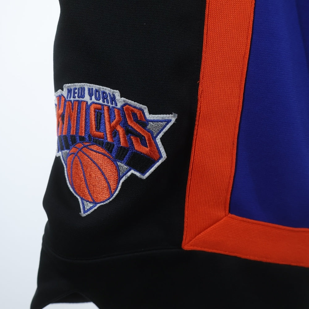 JUSTDON(ジャストドン) Mitchell & Ness NBA New York Knicks ミッチェル&ネス ニューヨークニックス ロゴワッペン トラックパンツ ジャージ ブルー/オレンジ