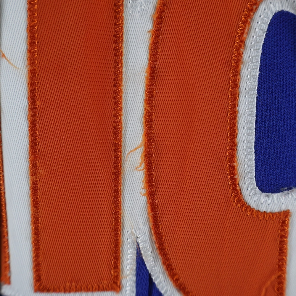 JUSTDON(ジャストドン) Mitchell & Ness NBA New York Knicks ミッチェル&ネス ニューヨークニックス ロゴワッペン トラックパンツ ジャージ ブルー/オレンジ