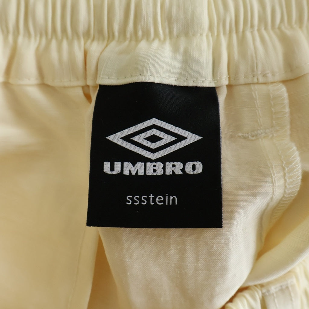 Stein(シュタイン) 25AW ×UMBRO アンブロ LINEN/NYLON TRACK PANTS リネン ナイロン トラックパンツ ロゴ刺繍 イージーパンツ アイボリー ST.1342