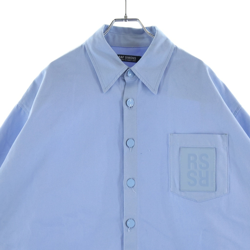 RAF SIMONS(ラフシモンズ) 23SS OVERSIZED DENIM SHIRT WITH LEATHER PATCH ロゴレザーパッチ デニムシャツ ライトブルー 231-M243