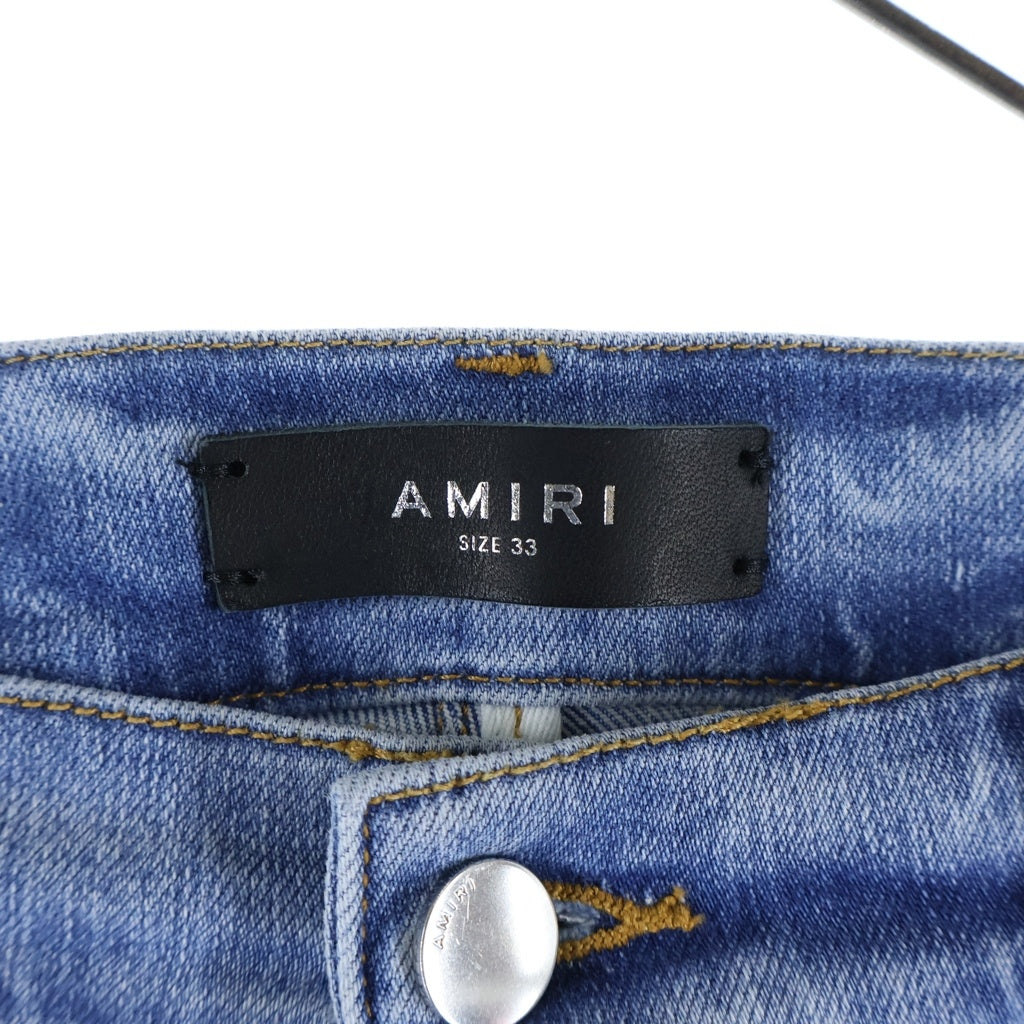 AMIRI(アミリ) マイクロスターバースト ロゴレザーパッチ ダメージ加工 スキニー デニムパンツ インディゴ J035 J102