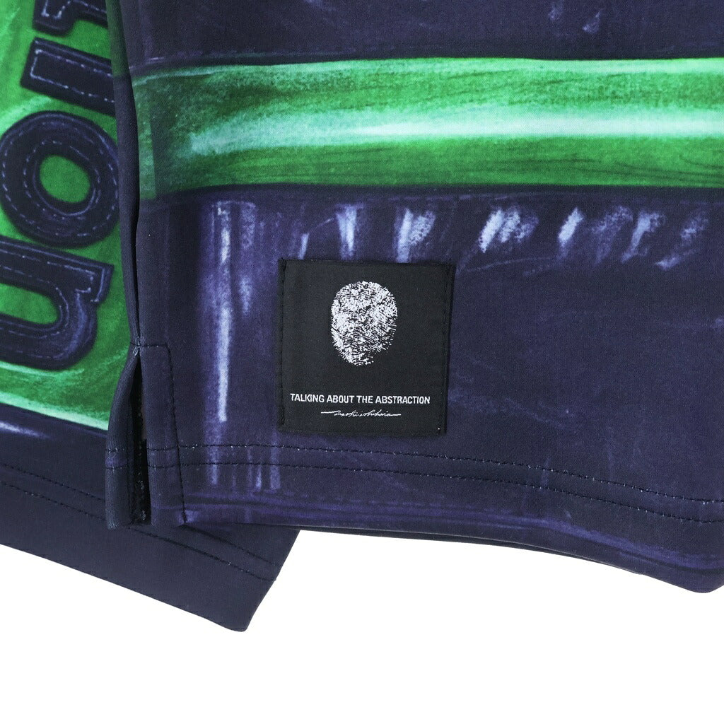 TALKING ABOUT THE ABSTRACTION(トーキング アバウト ザ アブストラクション) MOCK NECK PRINT L/S レーシングプリント モックネック 長袖Tシャツ ホワイト/グリーン NPT-J-005A