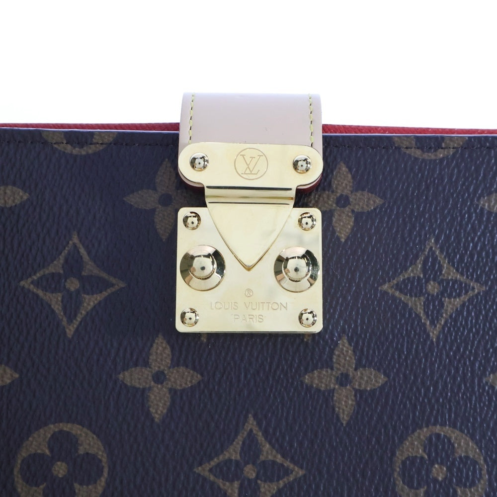 LOUIS VUITTON(ルイヴィトン) モノグラム クヴェルテュール・カルネ ポール ケース ブラウン×レッド PVCレザー 手帳カバー RFID GI0238