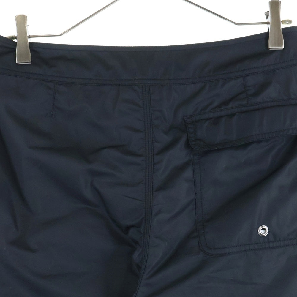 STUSSY(ステューシー) サーフマン ロゴ刺繍 ナイロン ハーフ ショートパンツ ショーツ ブラック