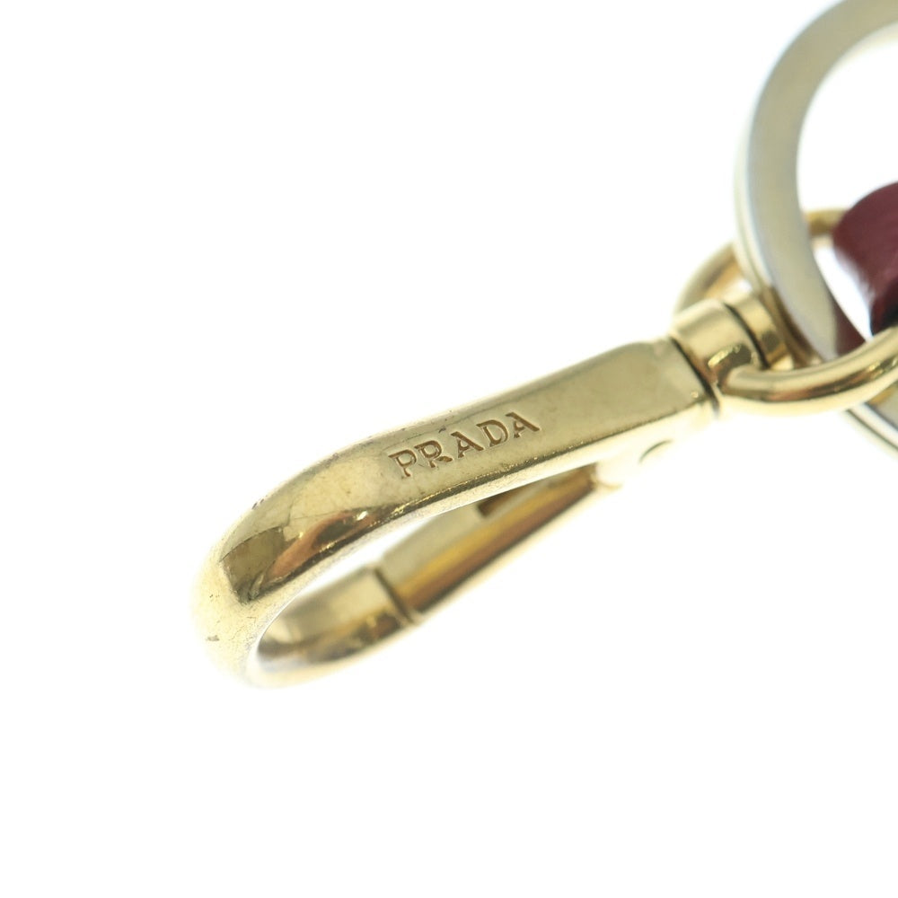 PRADA(プラダ) トライアングルロゴ キーリング バッグチャーム キーリング キーホルダー フィオッコ ゴールド×ピンク 1PP128