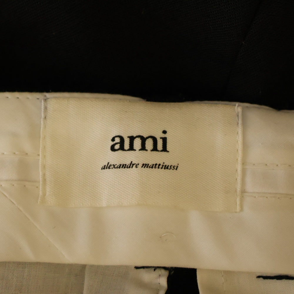 AMI Alexandre Mattiussi(アミアレクサンドルマテュッシ) キャロットフィットウールテーパードシルエットパンツ FTR010.203 ブラック レディース