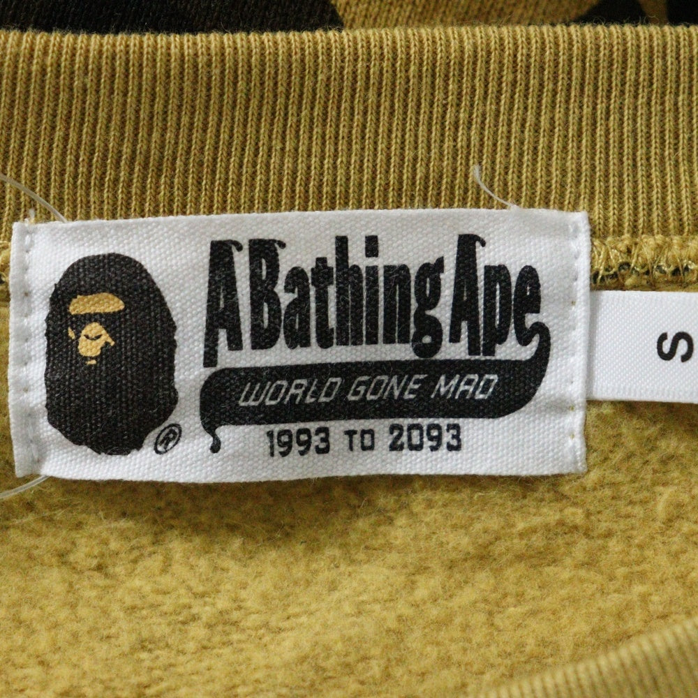 BAPE BY A BATHING APE(ベイプ ア ベイシング エイプ) Camo Shark Crew Sweatshirt シャークプリント カモフラ クルーネックスウェット トレーナー イエロー 001SWK801010M